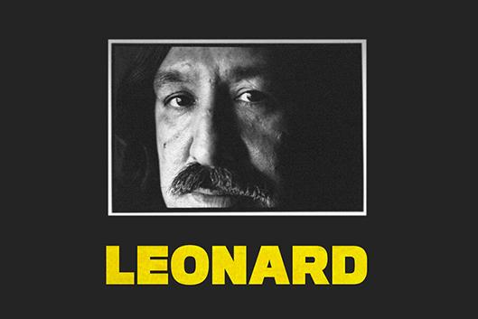 Close up of Leonard Peltier&amp;amp;amp;amp;#39;s face with his  name in bolded yellow letters below: Leonard